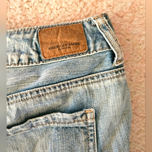 American Eagle Distressed Lightwash Jeans | Large Leg Holes - Picture 6 of 9